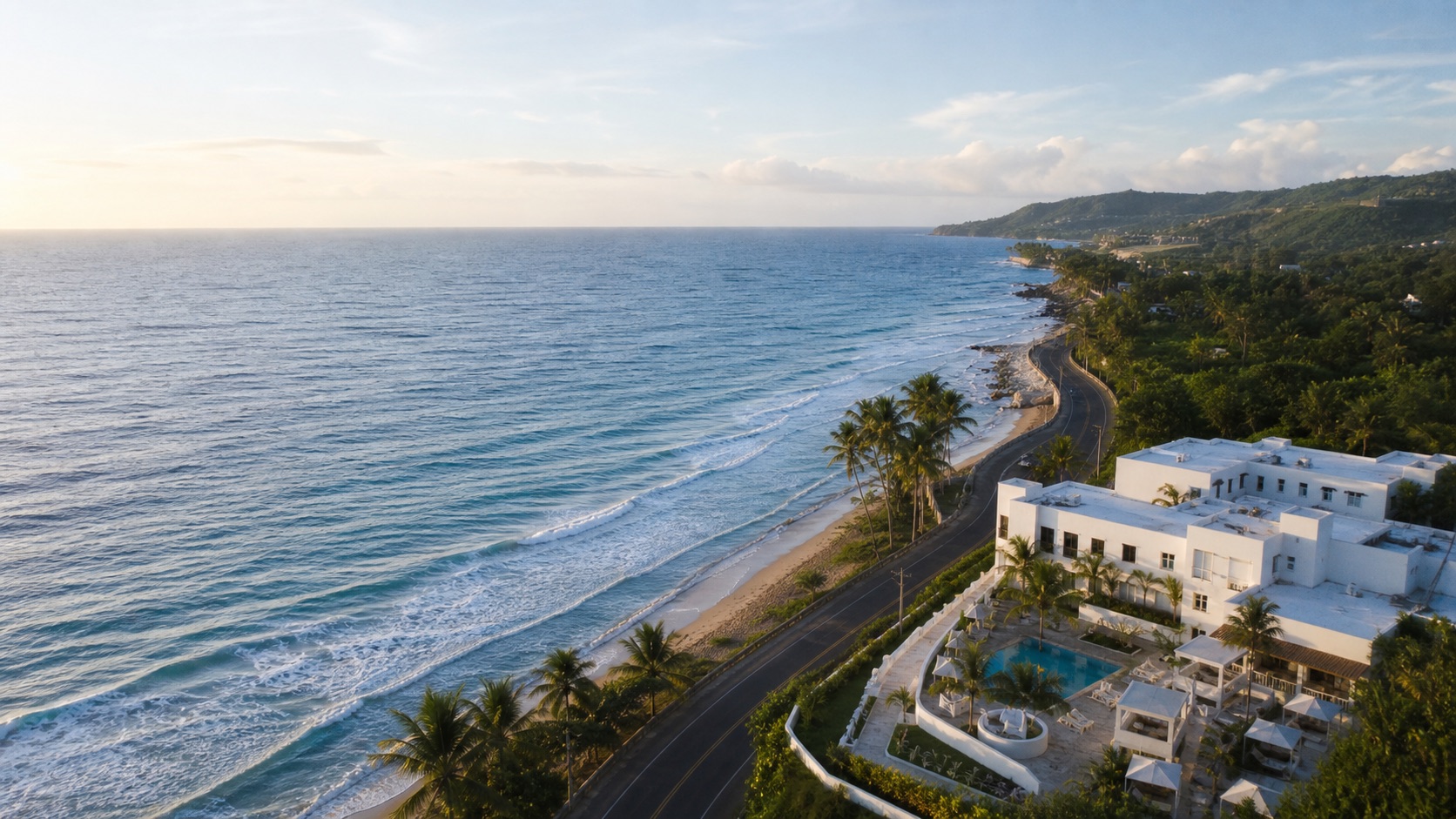 Drone still of a coastal hotel beside a Puerto Rico road and beach